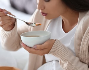 Woman Eating Soup_Cropped